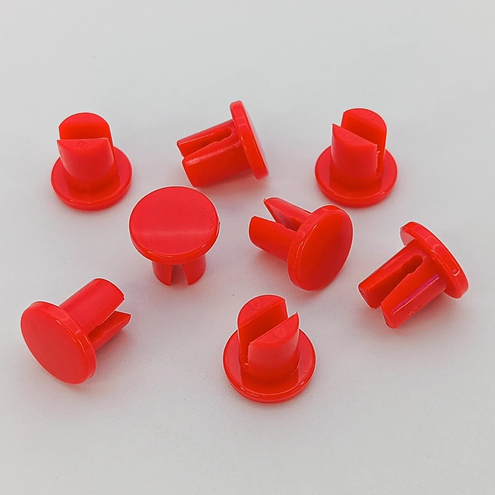 Red plastic wheelchair spoke guards for safety and durability