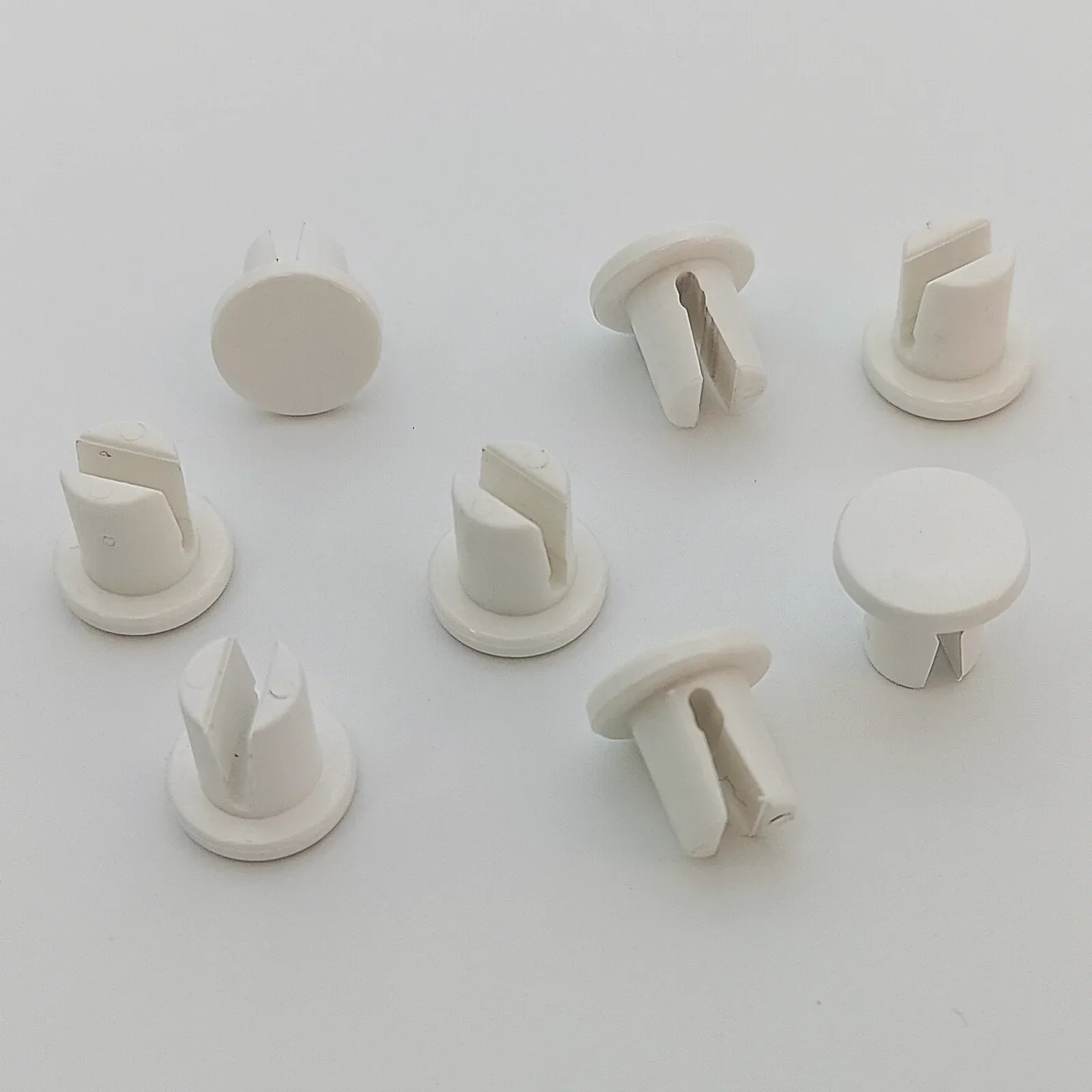 White plastic wheelchair spoke guards for wheel protection and safety