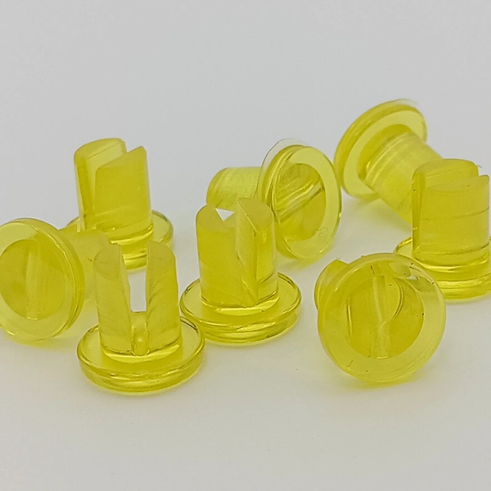 Yellow plastic wheelchair spoke guards for wheel safety and protection