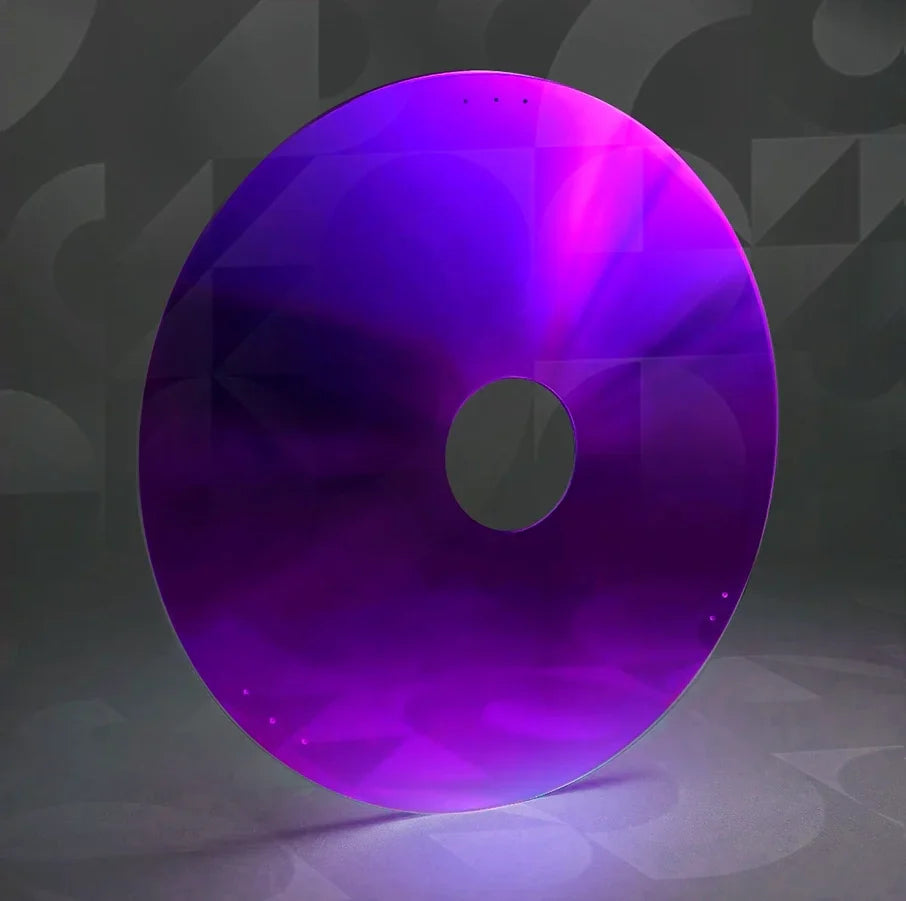 Purple wheelchair spoke guard disc with central hole on geometric background