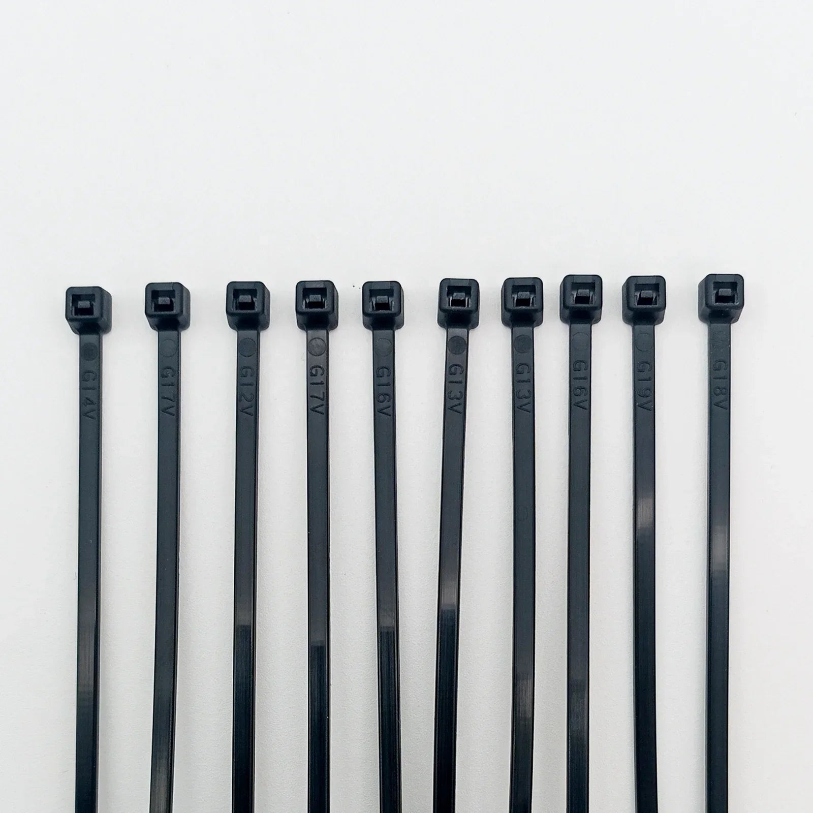 Black plastic cable ties for wheelchair accessories, durable and labeled for organization