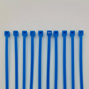 Blue plastic cable ties for wheelchair accessories and parts organization