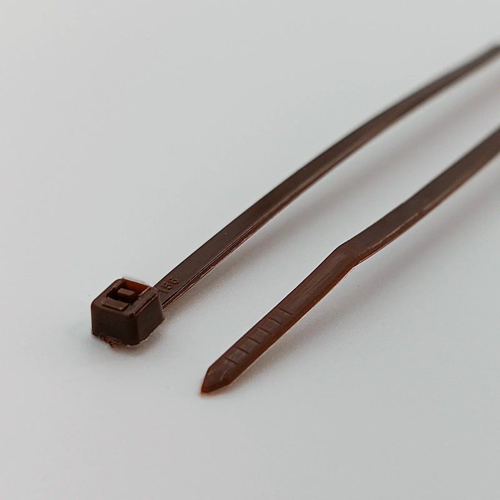 Brown plastic cable ties for wheelchair accessories and parts, durable and secure fastening solution