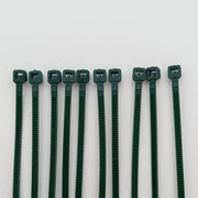 Dark green plastic cable ties for wheelchair accessories and parts organization