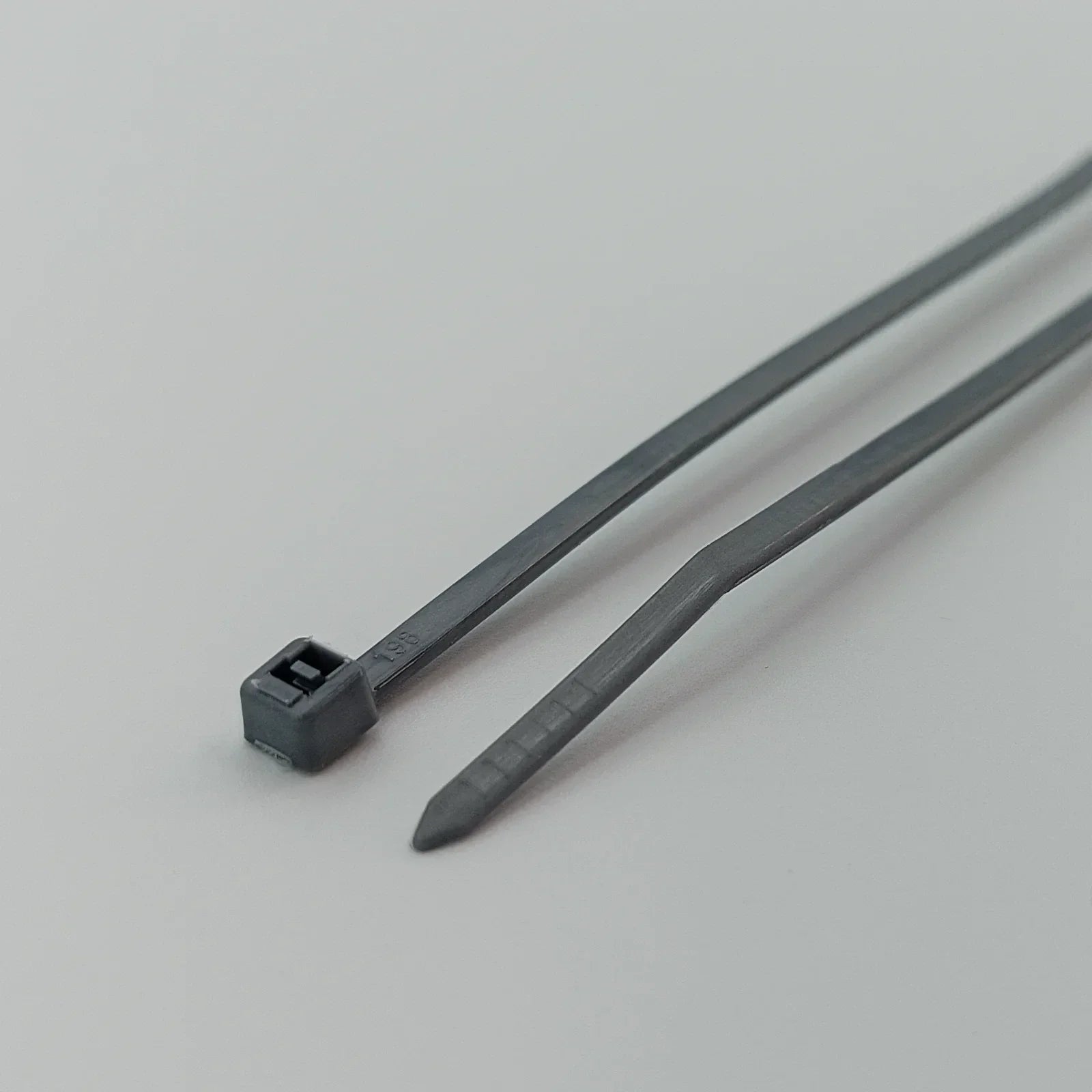 Black plastic cable ties for wheelchair accessories and parts, durable and secure fastening solution