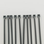 Gray plastic cable ties for wheelchair accessories and parts organization