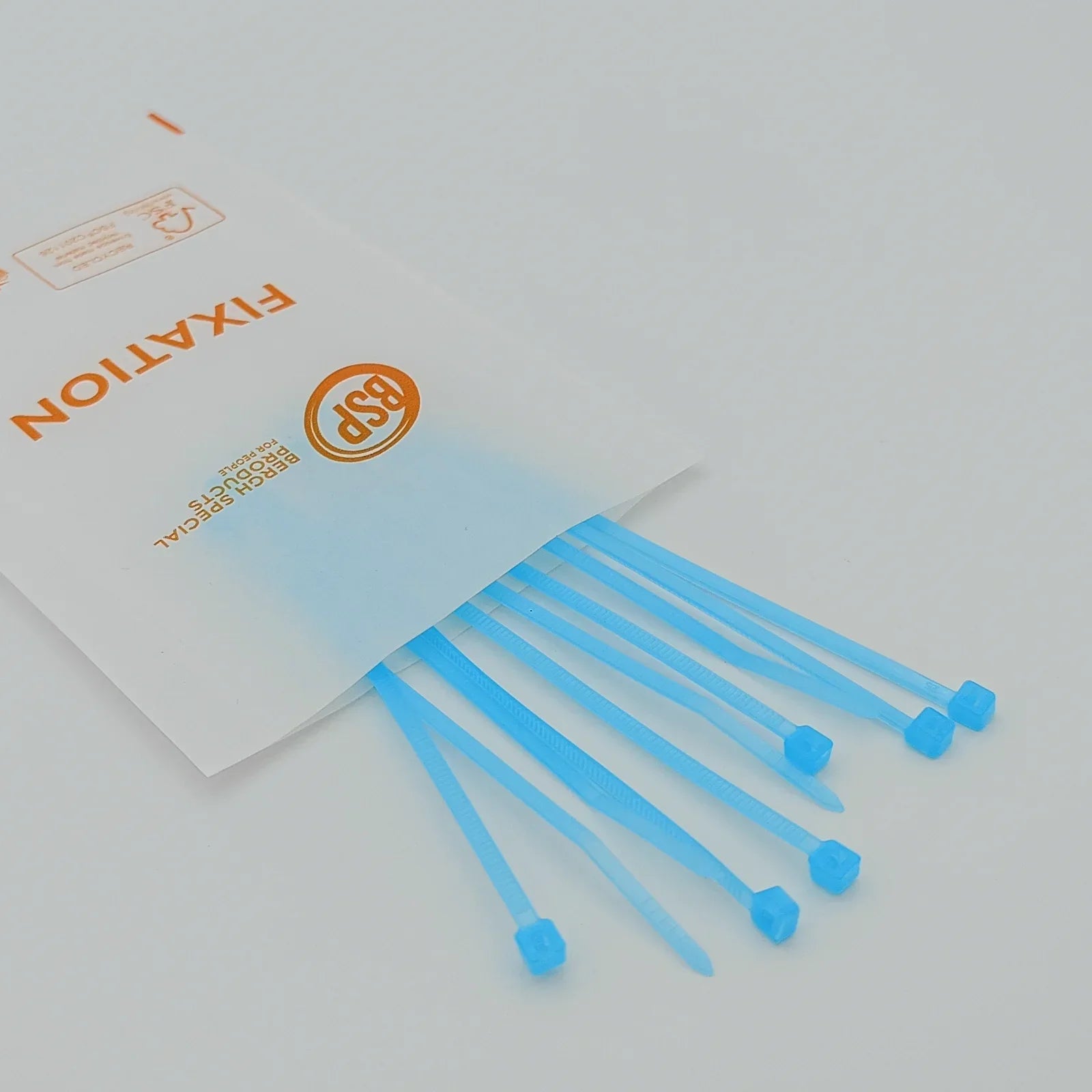 Blue plastic zip ties for wheelchair accessories, durable fixation tools from Bergh Special Products