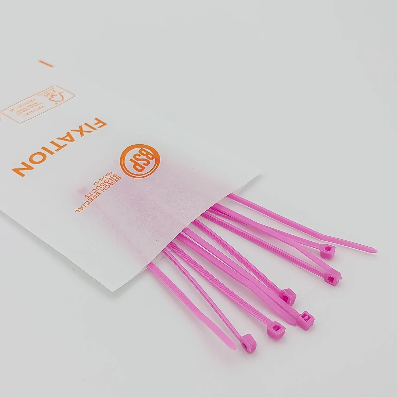 Pink plastic zip ties for wheelchair accessories, durable fixation solutions