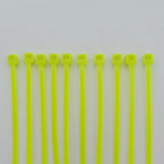 Bright yellow plastic cable ties for wheelchair accessories and durable equipment organization