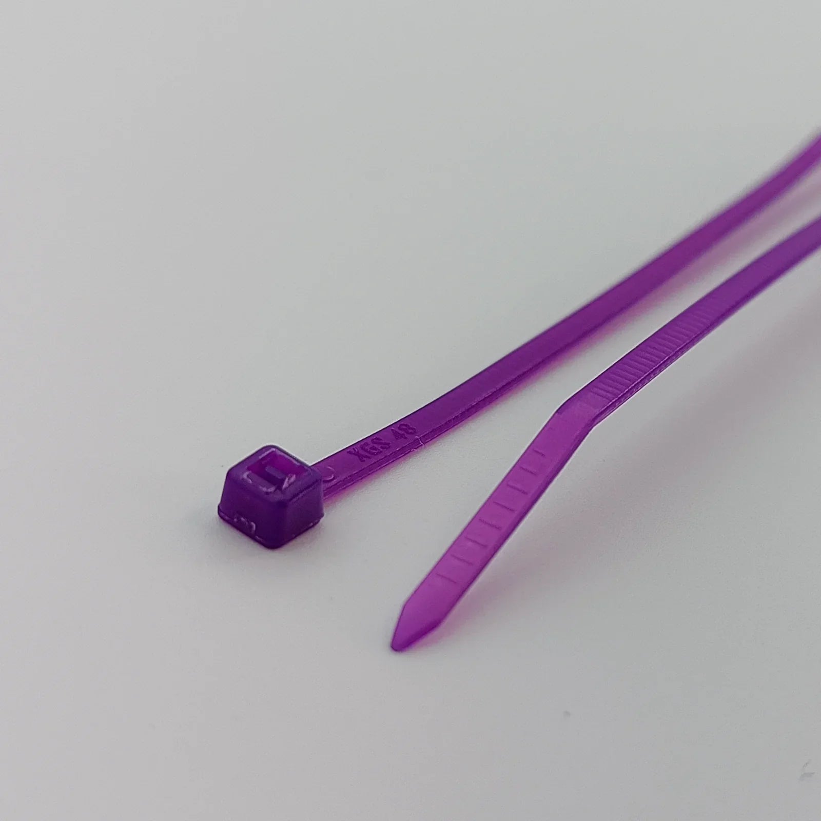 Purple plastic cable tie for wheelchair accessories, durable and secure fastener