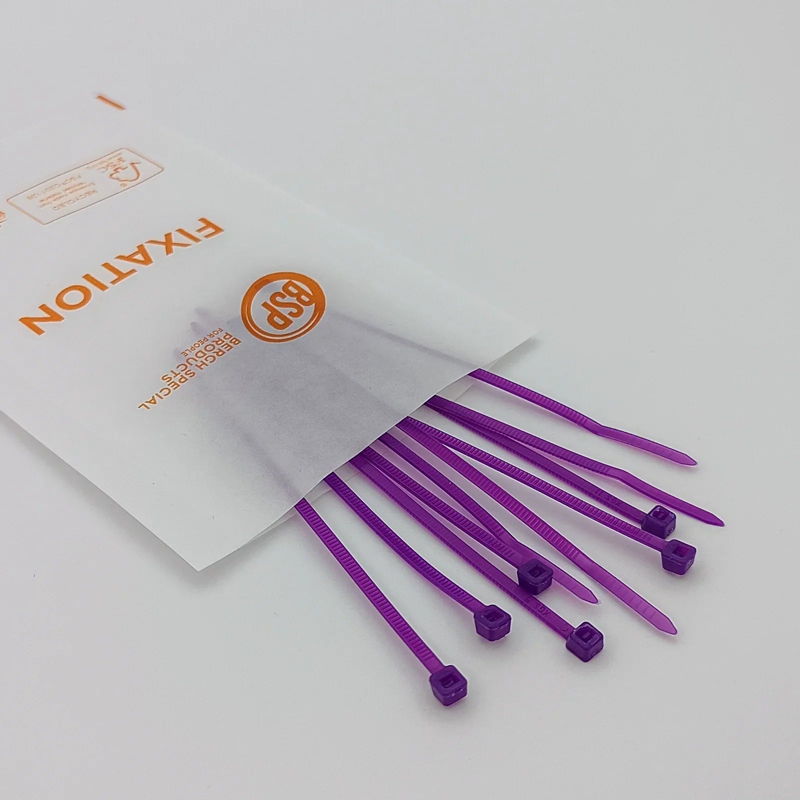 Purple plastic zip ties for wheelchair accessory fixation, packaged in clear sleeve with BSP branding