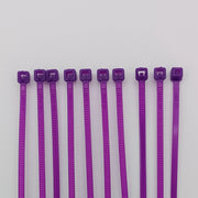 Purple plastic cable ties for wheelchair accessories and parts organization