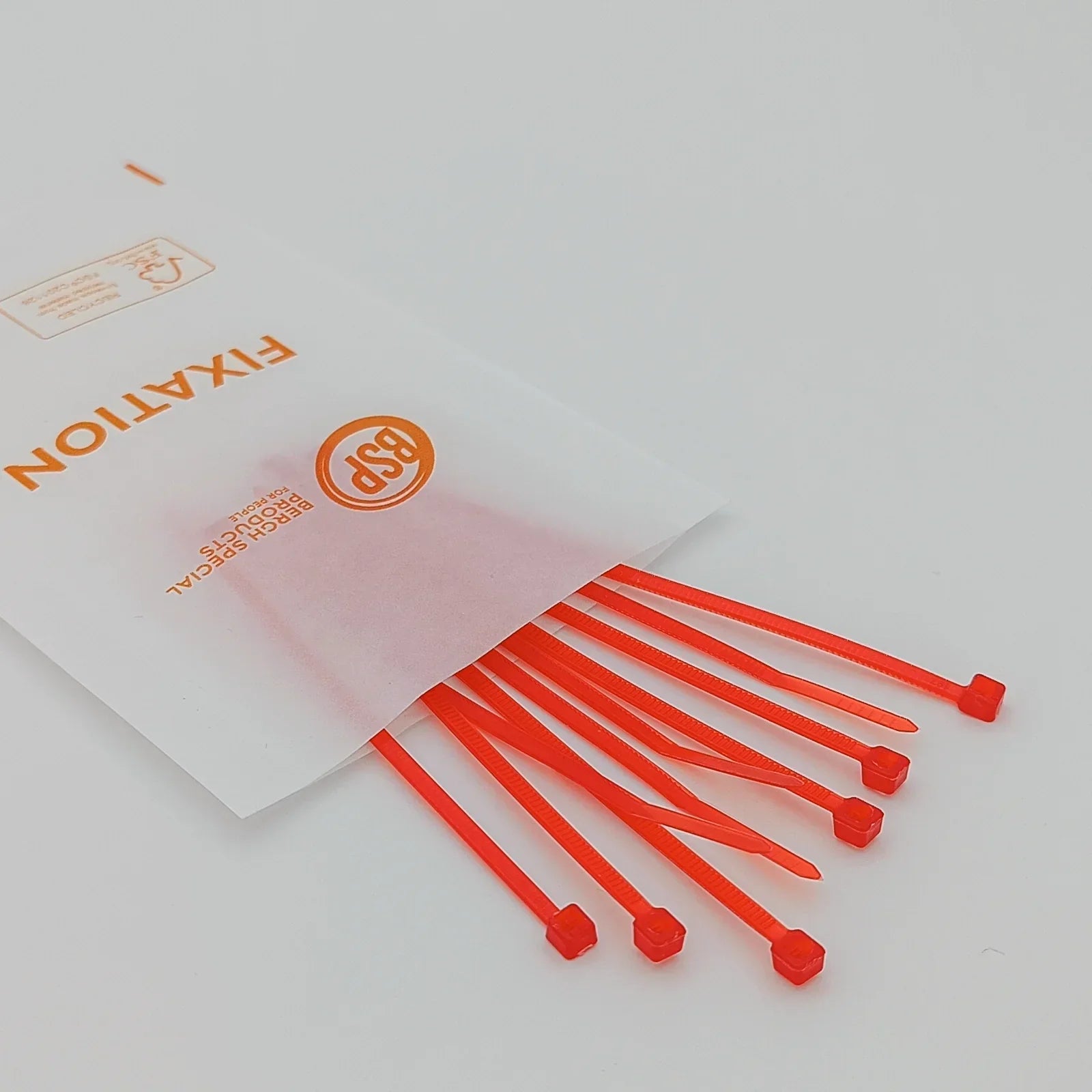 Bright orange cable ties for wheelchair accessories, durable fixation solutions for mobility equipment