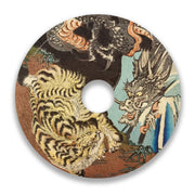 Wheelchair spoke guard featuring a fierce tiger and dragon illustration on a round disc.
